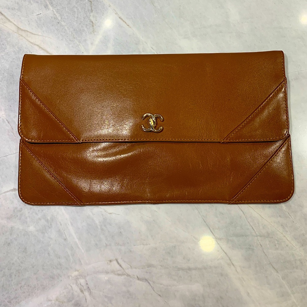 Carmel vintage leather clutch with gold emblem inside zipped pouch 11” x 6.5”